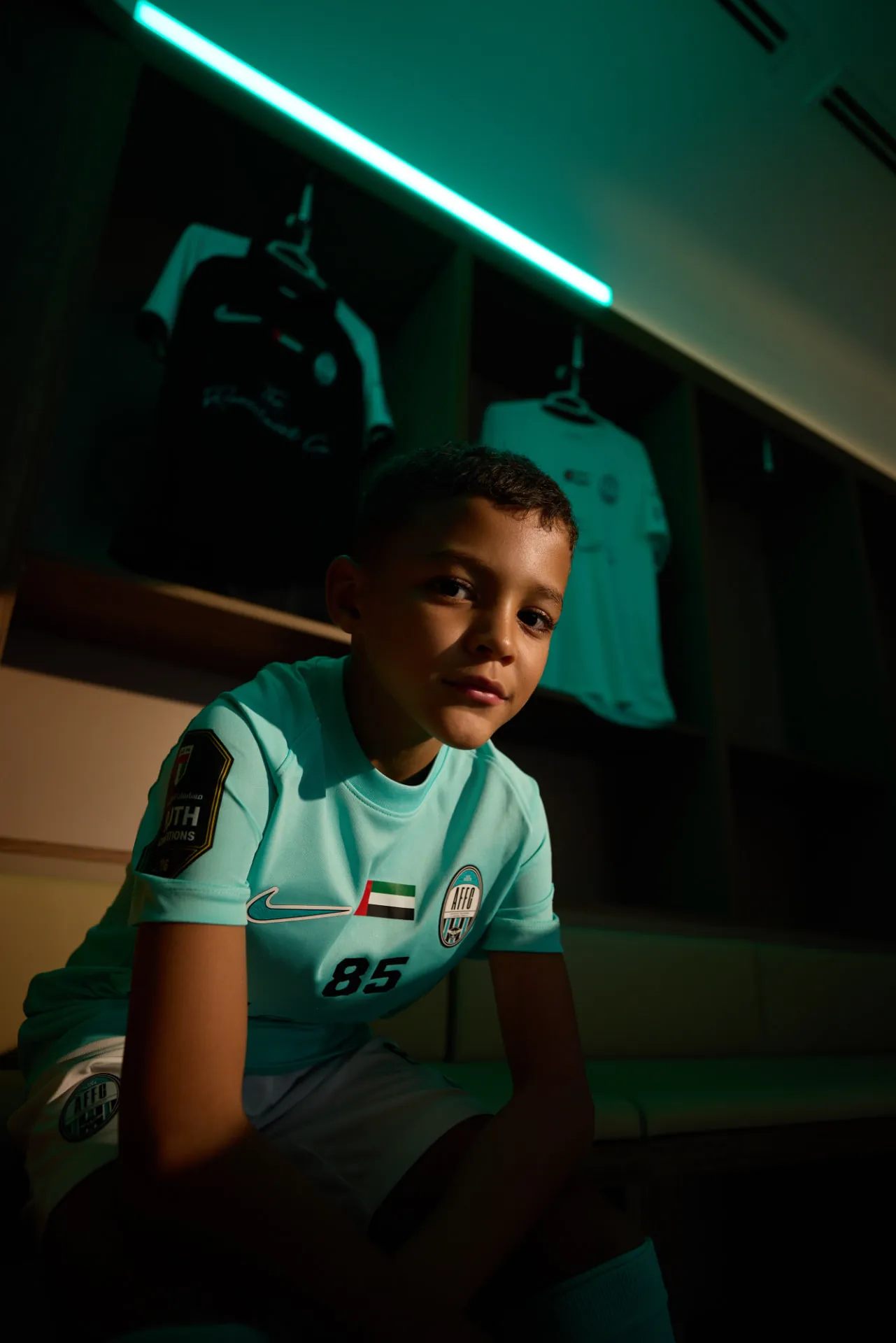 Arabian Falcons FC youth player in official club kit
