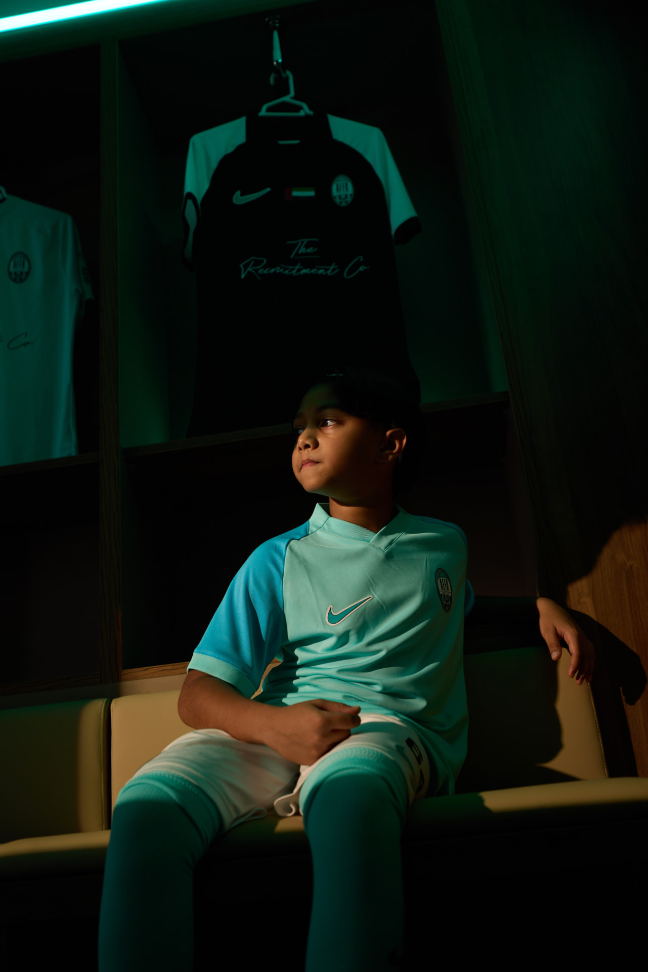 Arabian Falcons Academy player in the club dressing room